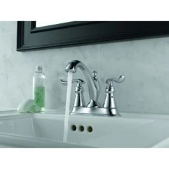 Delta Linden Centerset Bathroom Faucet With Diamond Seal Technology - Includes Plastic Pop-Up Drain And Lifetime Warranty -Bathroom Sales Store delta 2594 tp dst application shot 531