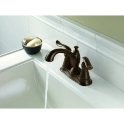 Delta Linden Centerset Bathroom Faucet With Diamond Seal Technology - Includes Plastic Pop-Up Drain And Lifetime Warranty -Bathroom Sales Store delta 2594 tp dst application shot 535