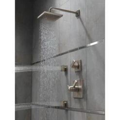 Delta 2.5 GPM 8" Wide Rain Shower Head With Shower Arm, Flange And Touch-Clean® Technology - Limited Lifetime Warranty -Bathroom Sales Store delta 57740 running shower system in brilliance stainless 1404