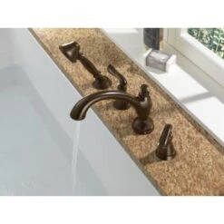 Delta Linden Deck Mounted Roman Tub Filler Trim With Hand Shower -Bathroom Sales Store delta t4794 running faucet in venetian bronze 1161
