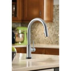 Delta Trinsic Pull-Down Kitchen Faucet With On/Off Touch Activation, Magnetic Docking Spray Head, And Soap/Lotion Dispenser - Includes Lifetime Warranty (5 Year On Electronic Parts) -Bathroom Sales Store delta 9159t dst application shot 431