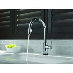 Delta Trinsic Pull-Down Kitchen Faucet With On/Off Touch Activation, Magnetic Docking Spray Head, And Soap/Lotion Dispenser - Includes Lifetime Warranty (5 Year On Electronic Parts) -Bathroom Sales Store delta 9159t dst application shot 434