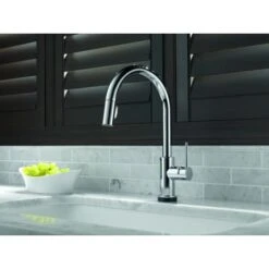 Delta Trinsic Pull-Down Kitchen Faucet With On/Off Touch Activation, Magnetic Docking Spray Head, And Soap/Lotion Dispenser - Includes Lifetime Warranty (5 Year On Electronic Parts) -Bathroom Sales Store delta 9159t dst application shot 435