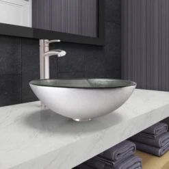 VIGO Milo 16-1/2" Glass Vessel Bathroom Sink With 1.2 GPM Deck Mounted Bathroom Faucet And Pop-Up Drain Assembly 8 VIGO Milo 16-1/2" Glass Vessel Bathroom Sink With 1.2 GPM Deck Mounted Bathroom Faucet And Pop-Up Drain Assembly -Bathroom Sales Store vigo vgt1062 installed setting 77